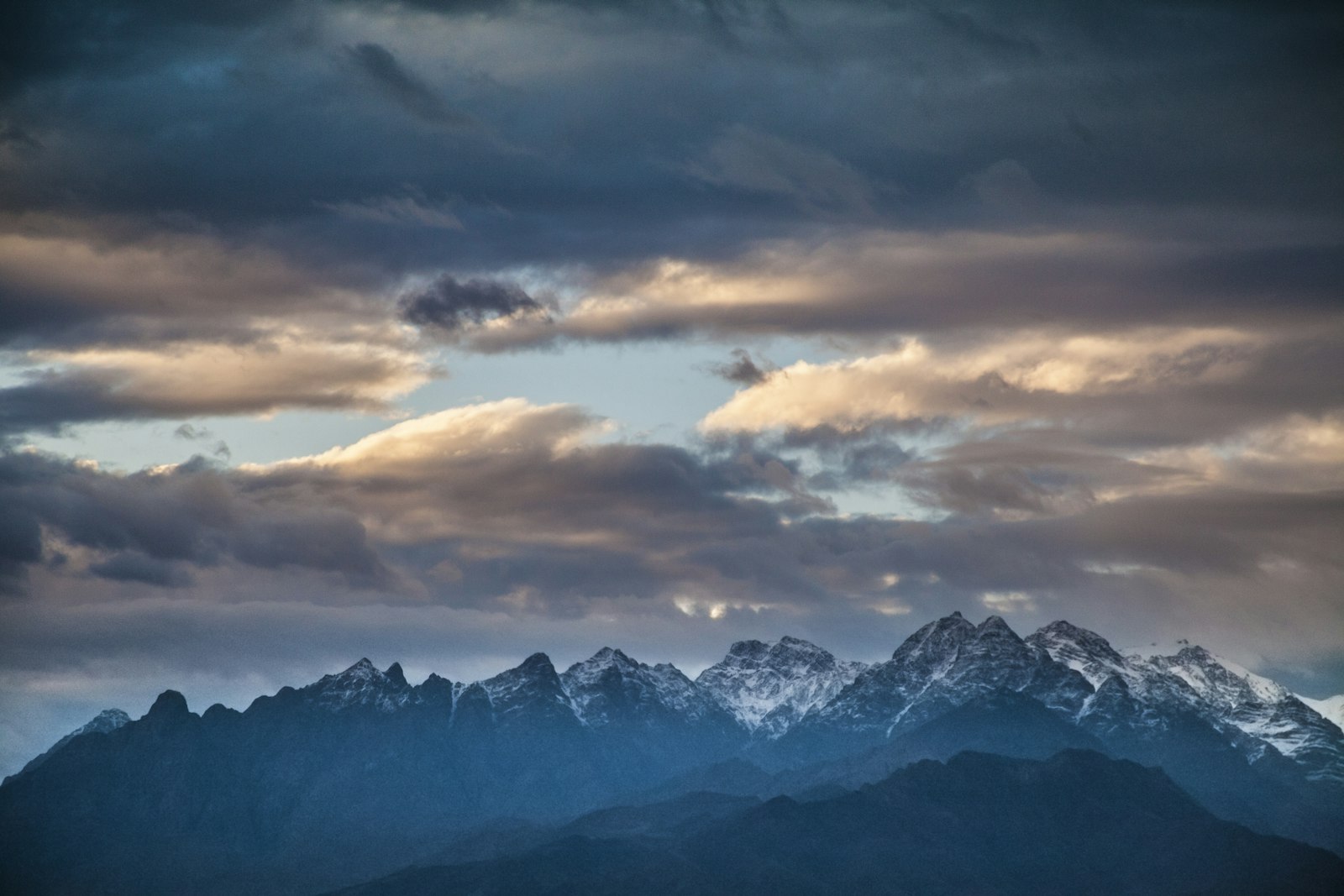 Canon EOS 5D Mark II + Canon EF 28-135mm F3.5-5.6 IS USM sample photo. Snowcap mountains under sky photography