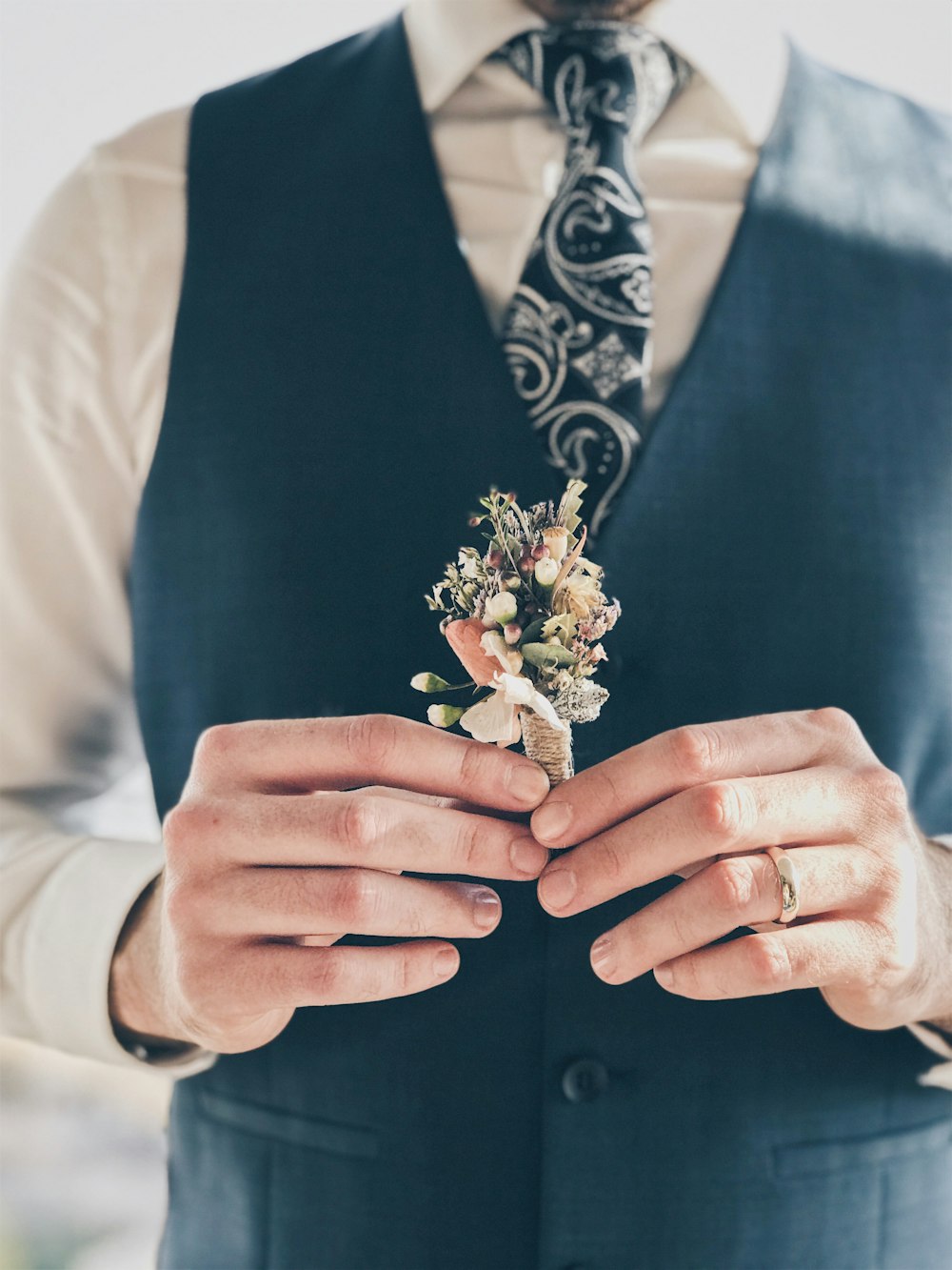 person holding bouquet of flower