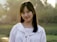 woman in white striped top