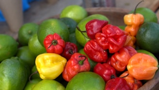 A basket filled with a colorful mix of potatoes, kinnows, mangoes, and onions showcasing the variety we offer.