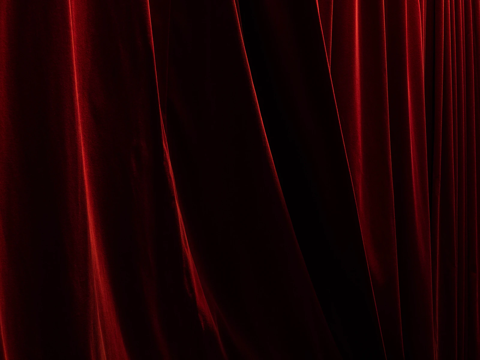 Terciopelo rojo profundo como fondo editorial de sección