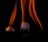 Two ice cubes are placed on a reflective surface with orange flames rising above each cube against a dark background.