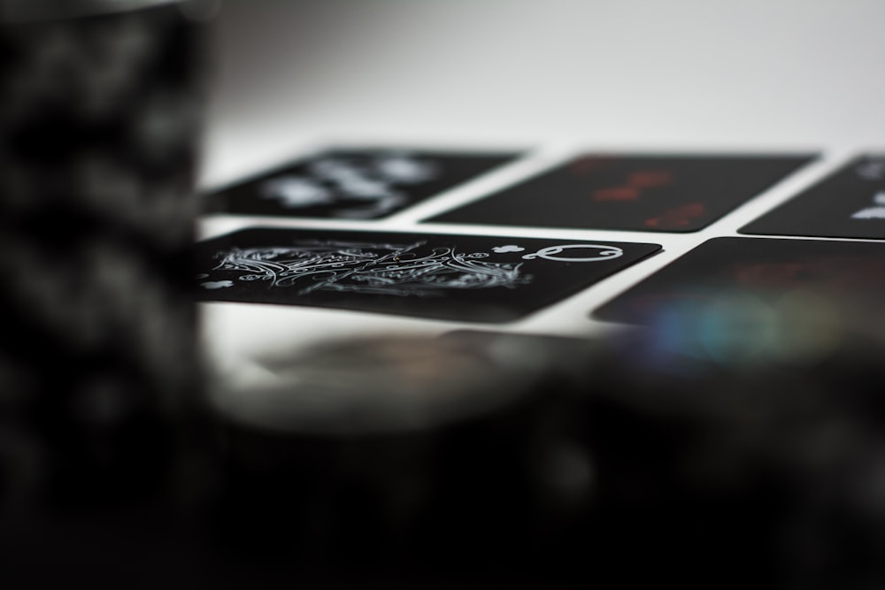 a stack of playing cards sitting on top of a table