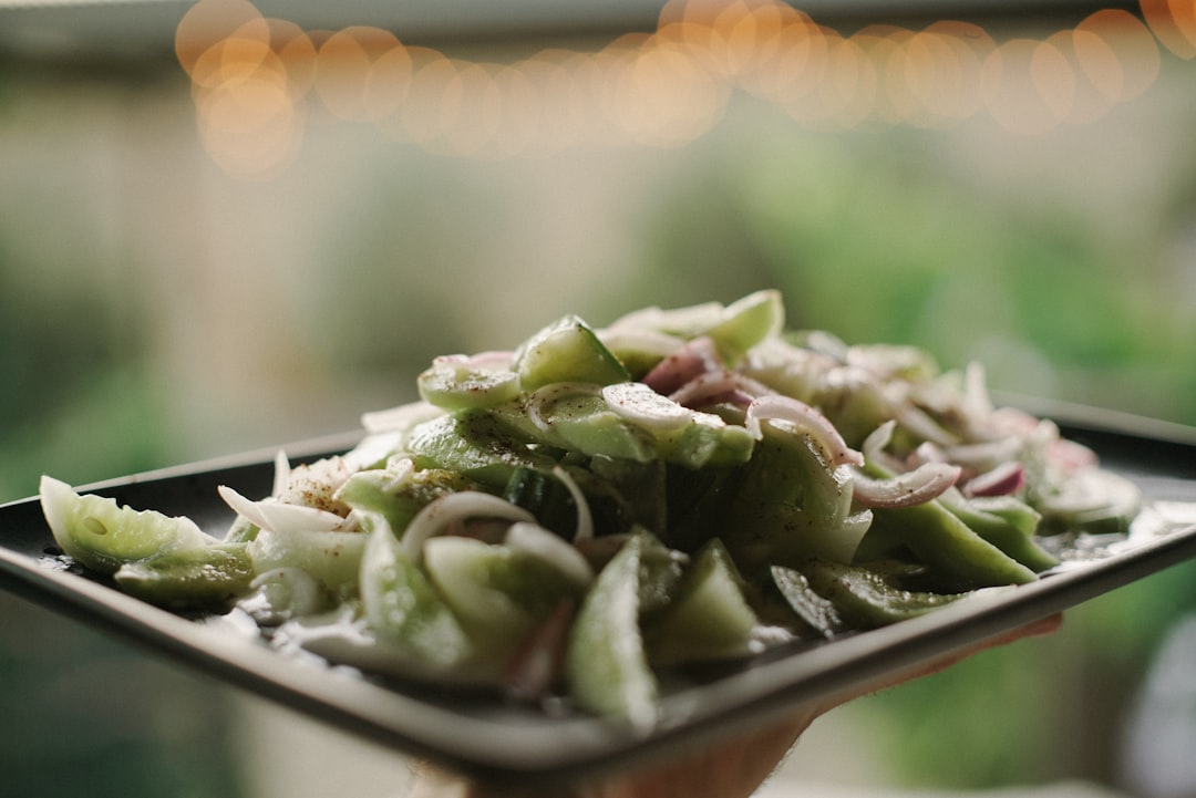 green vegetables on tray selective-focus photography