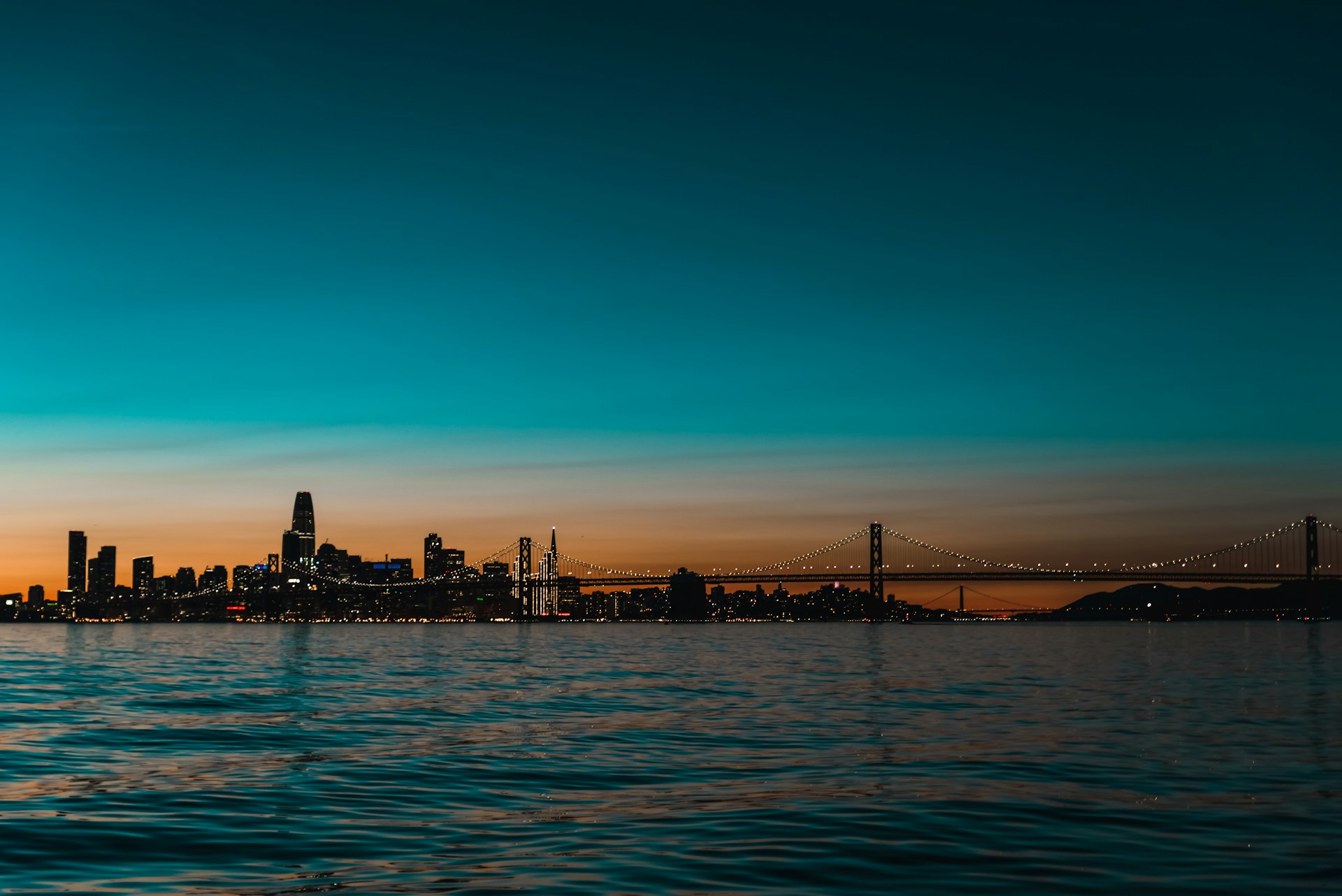 suspension bridge photo during dawn