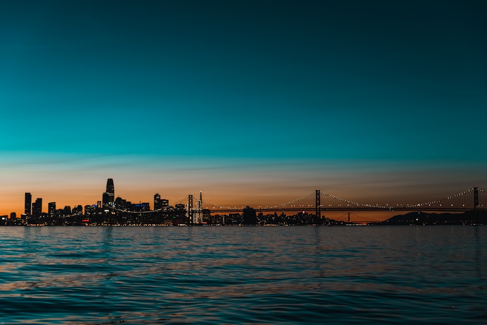 suspension bridge photo during dawn