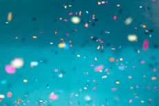 selective focus photography of multicolored confetti lot