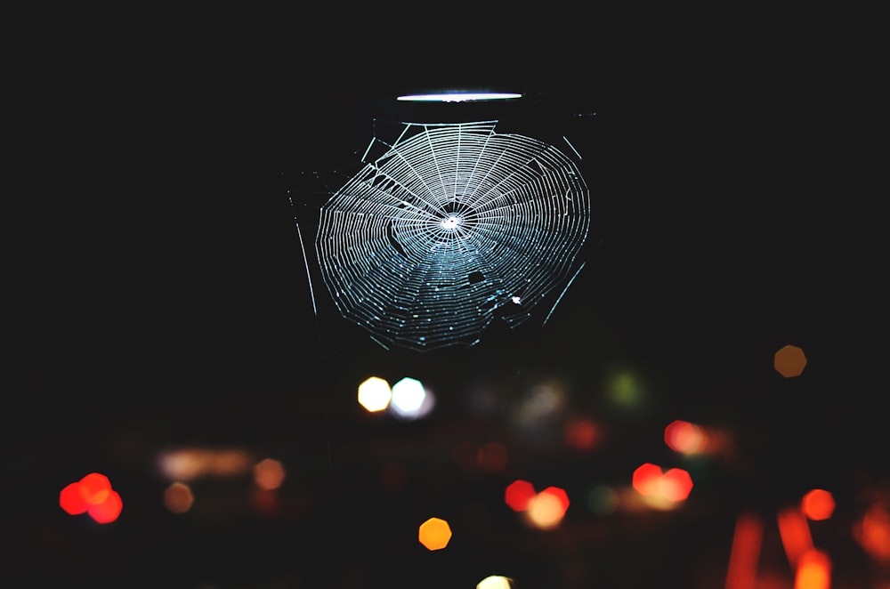 selective focus photography of cabweb at nighttime