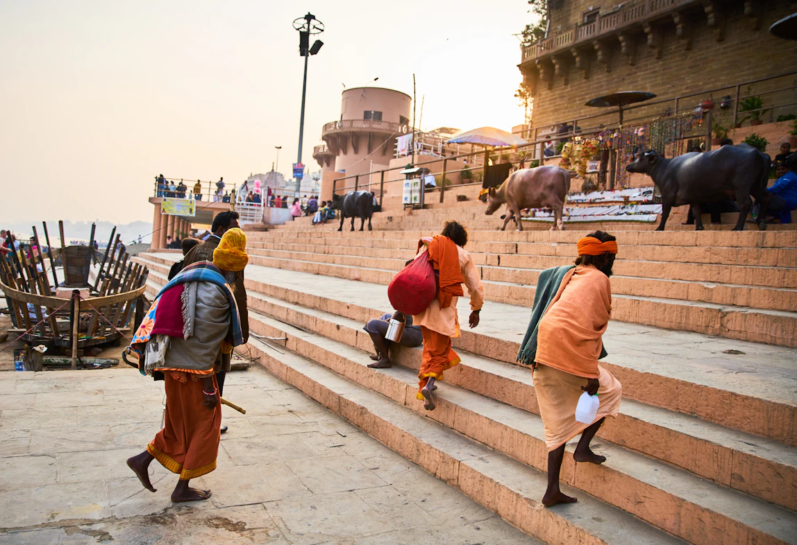 Sadhus and pilgrims on the steps of Varanasi