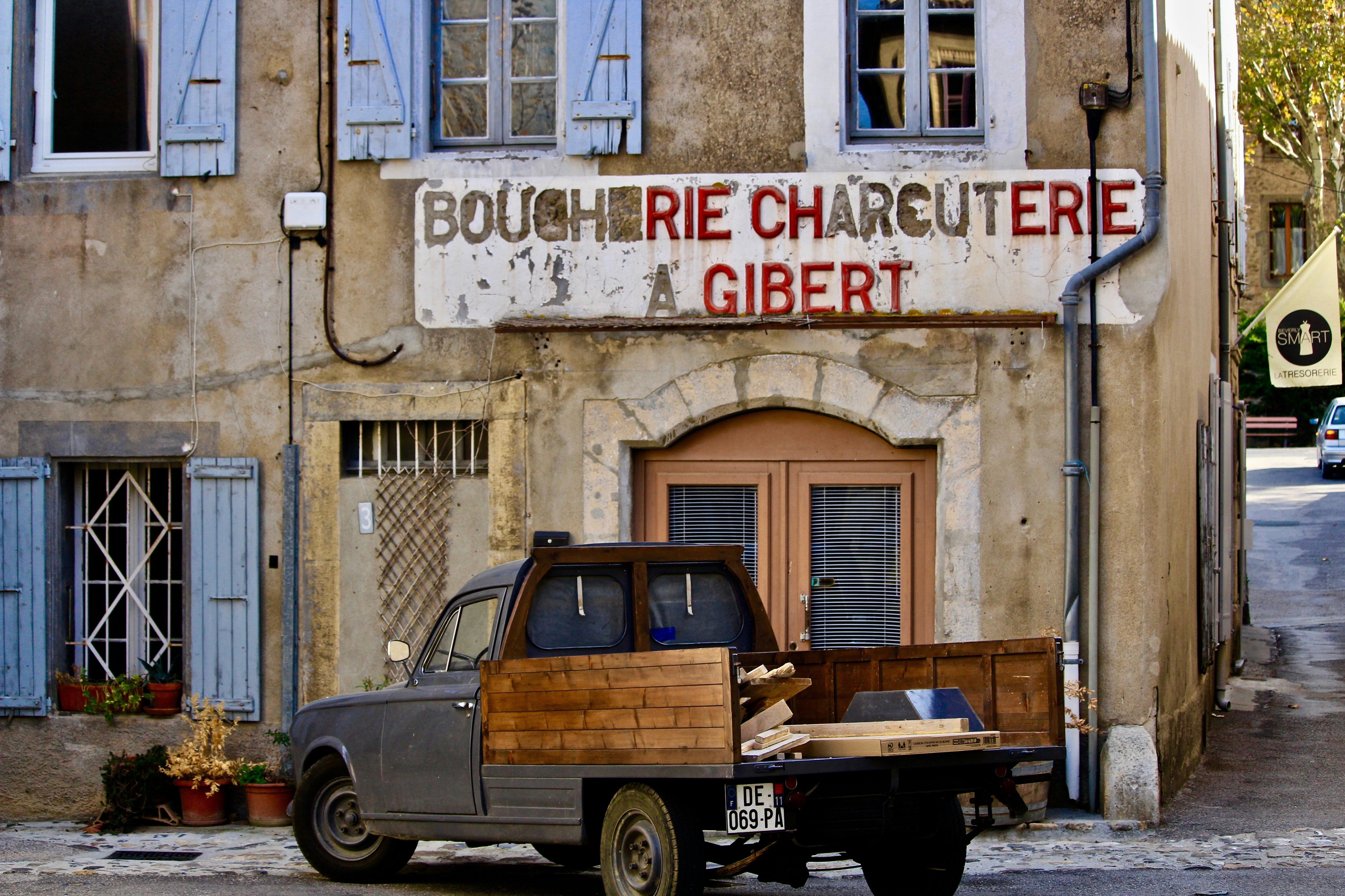 truck in front of store during daytime