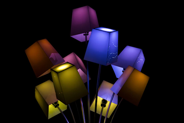 A vibrant close-up of a colorful geometric lamp casting playful shadows.