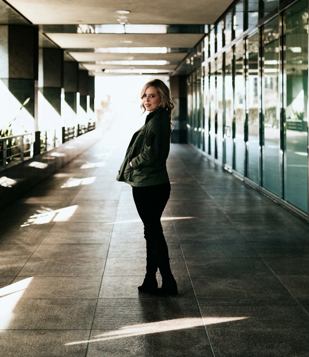 woman standing in hallway