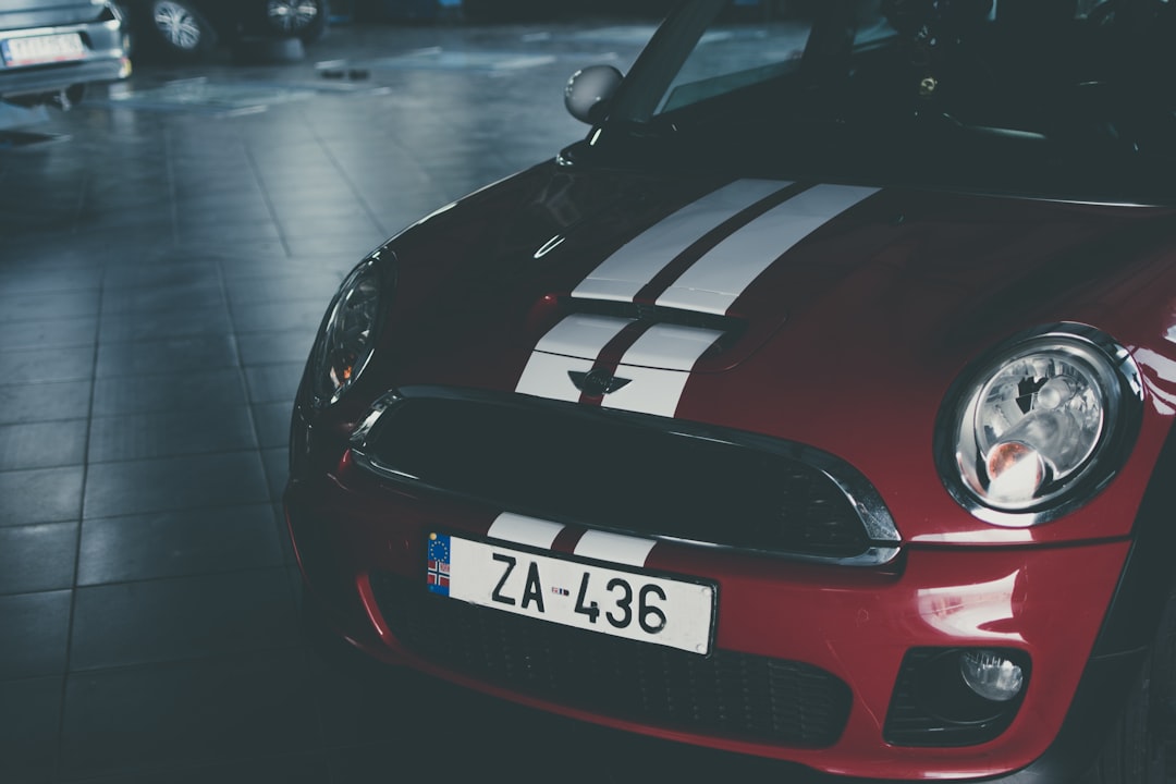 red and white Mini Cooper,