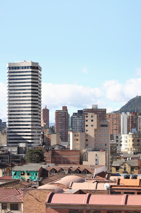 assorted-color buildings under blue skies at daytime in Bogota Colombia