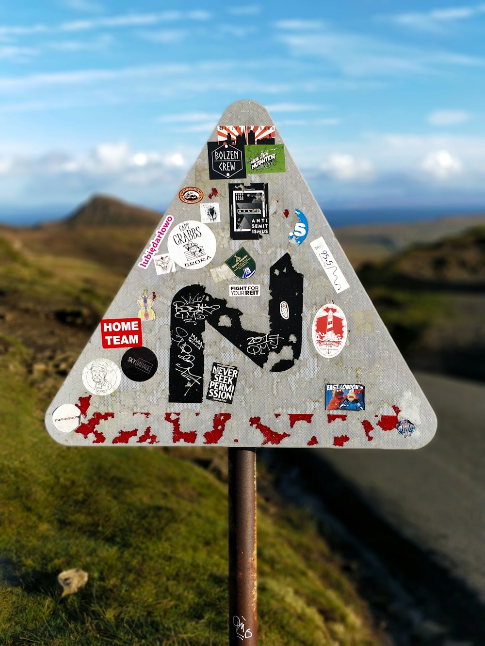 stickers on road signage