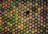 Close-up of colorful paint cans arranged on a wooden surface.