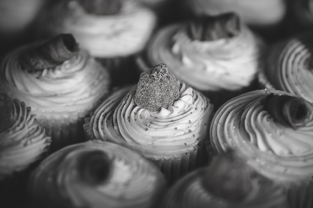 grayscale photo of cupcakes