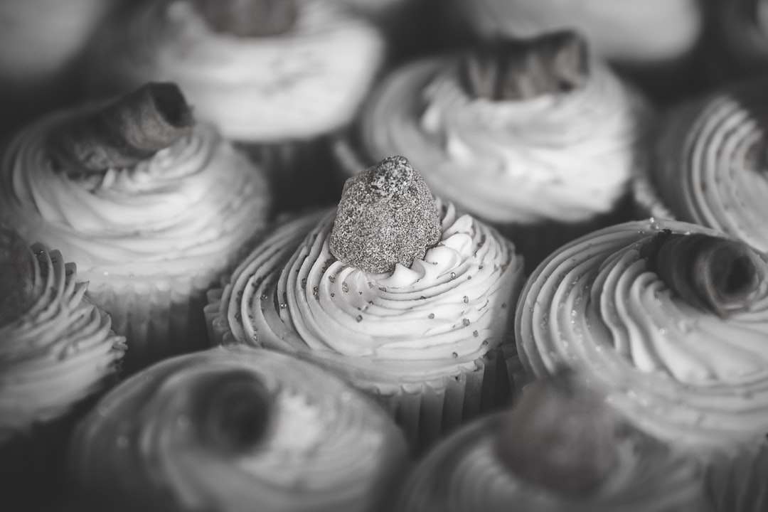 grayscale photo of cupcakes