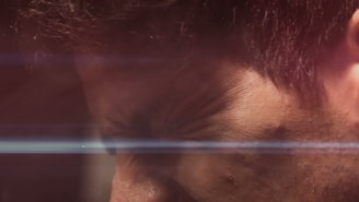 Close-up of a frown with minimal lines between the eyebrows.