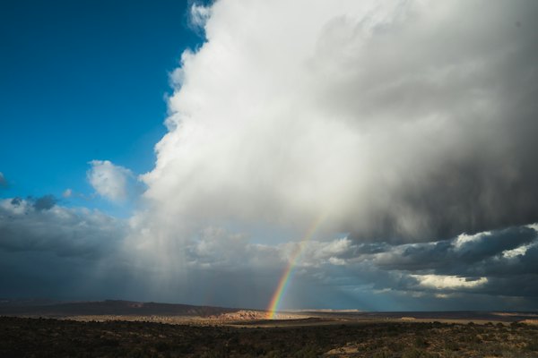 Rainbow under cloudy skies — Moab, United States