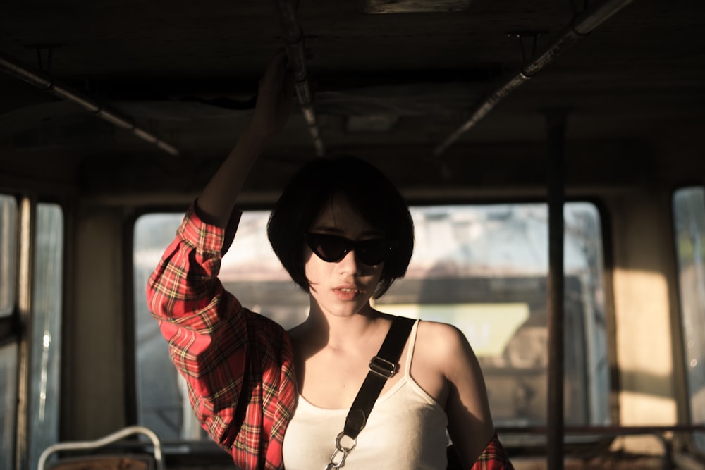 woman standing on train