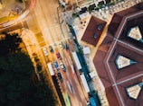 Wide angle view of a bustling urban intersection featuring multiple FOOH installations.