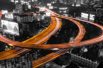 A digital overlay of a city skyline with transportation routes.