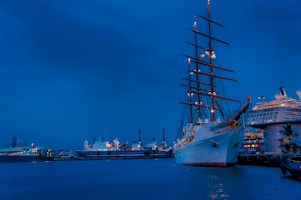 white ship on blue sea