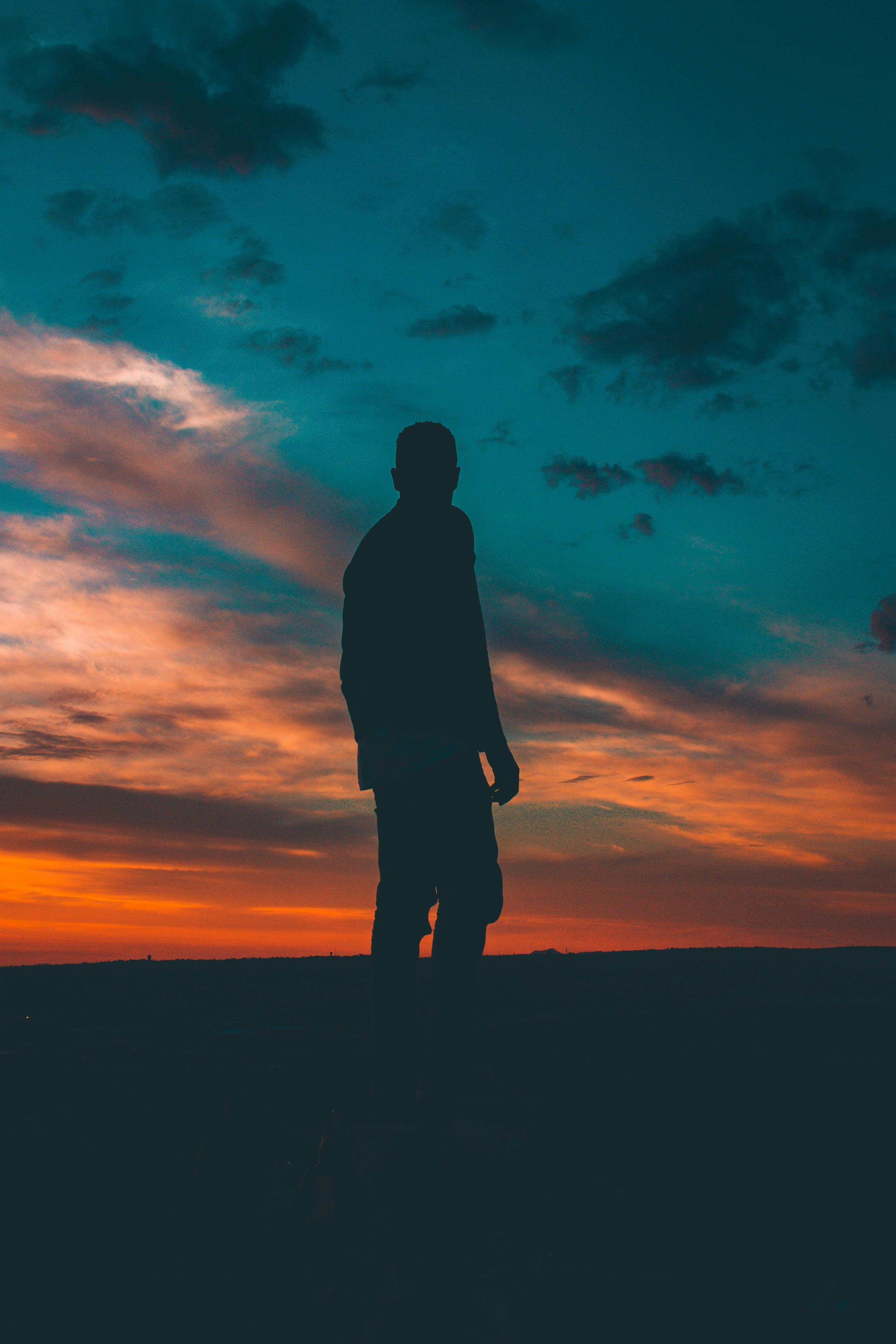 silhouette on man standing on ground