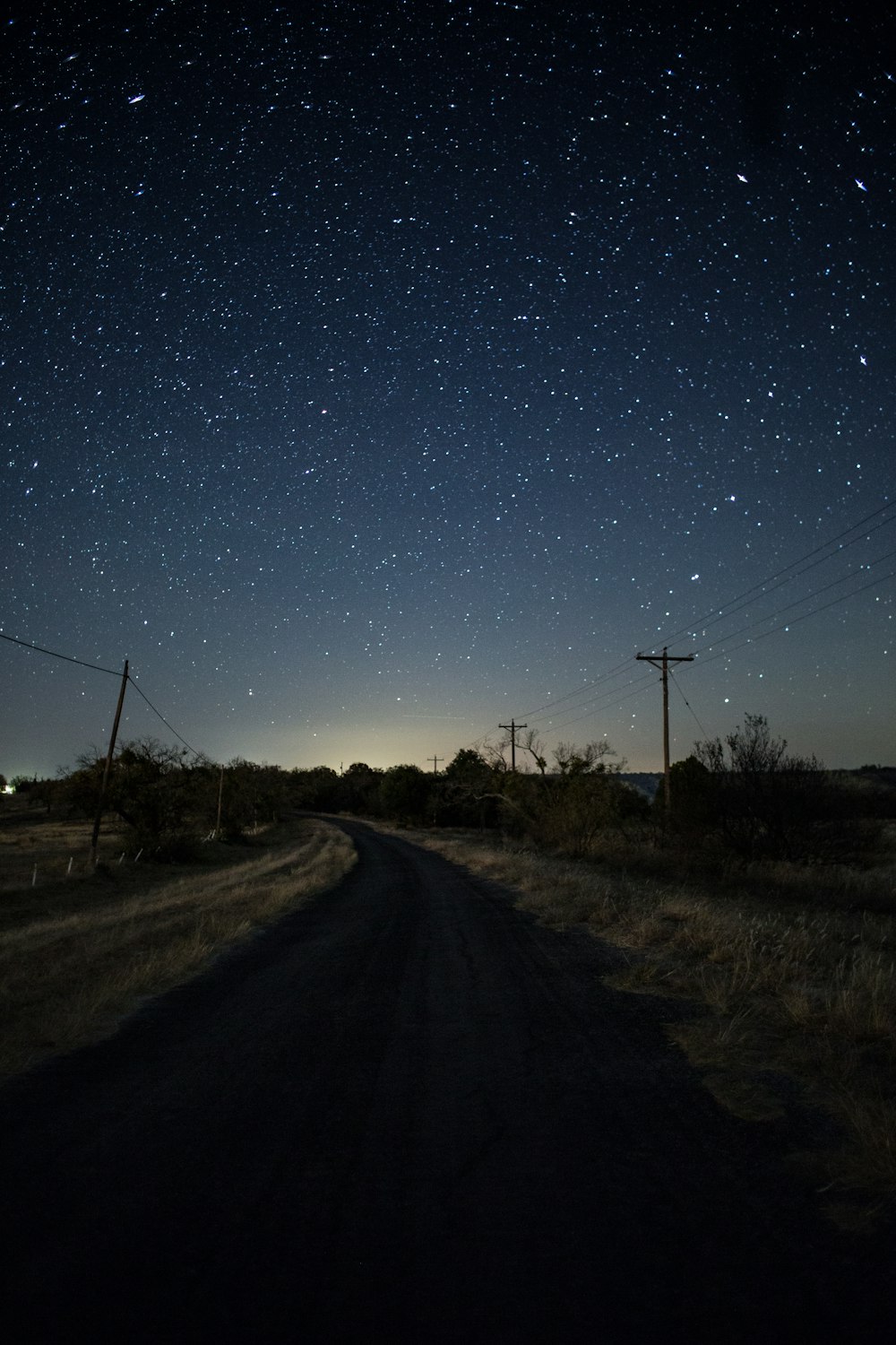 empty road under starry nights