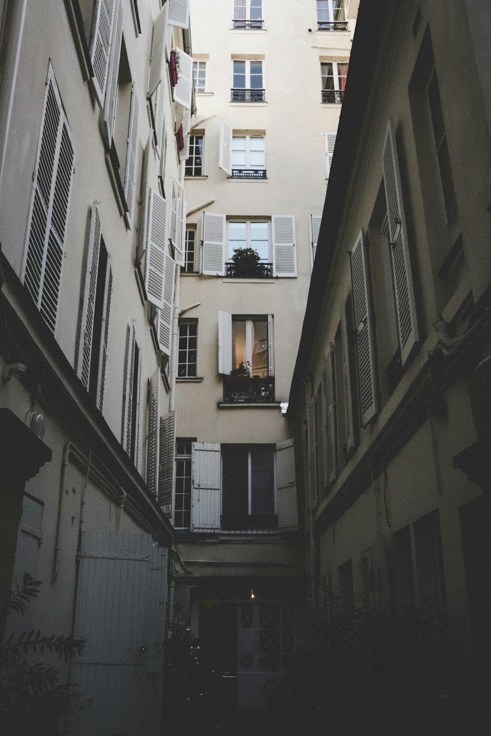 low angle photography of white concrete building at daytime