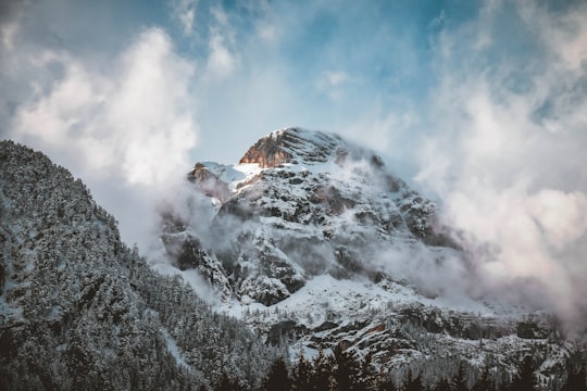 brown mountain covered of snow during daytime in Wiesing Austria