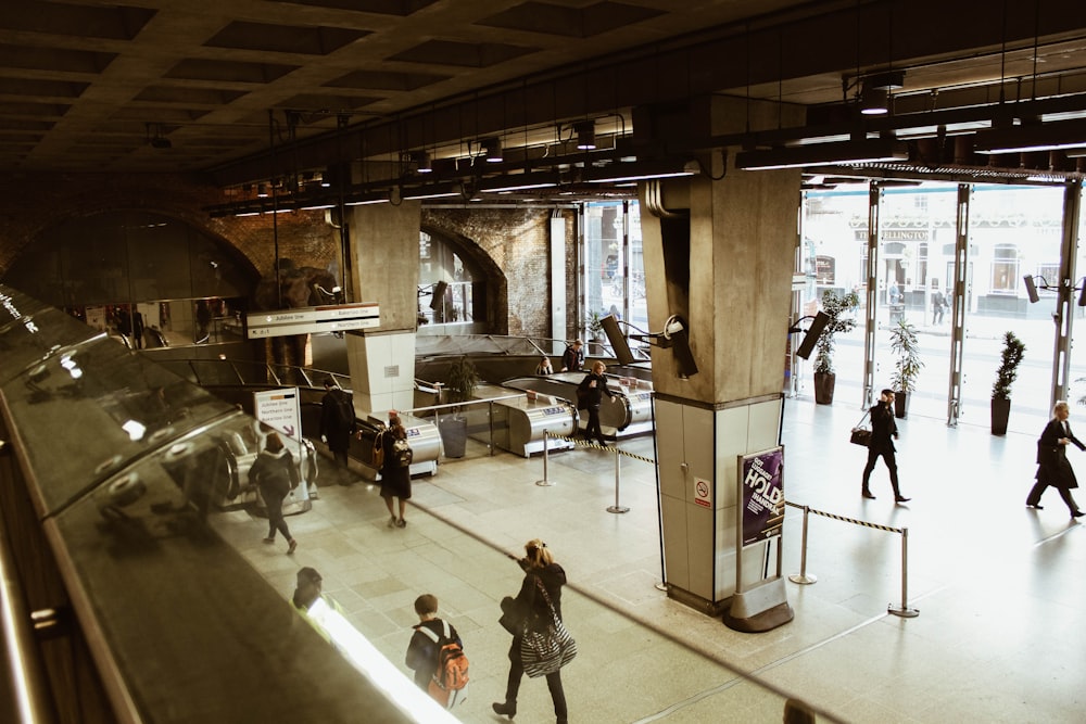 people inside concrete building