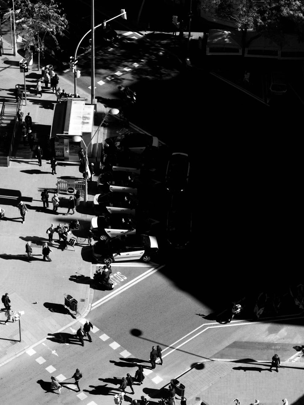 grayscale photography of building and group of person