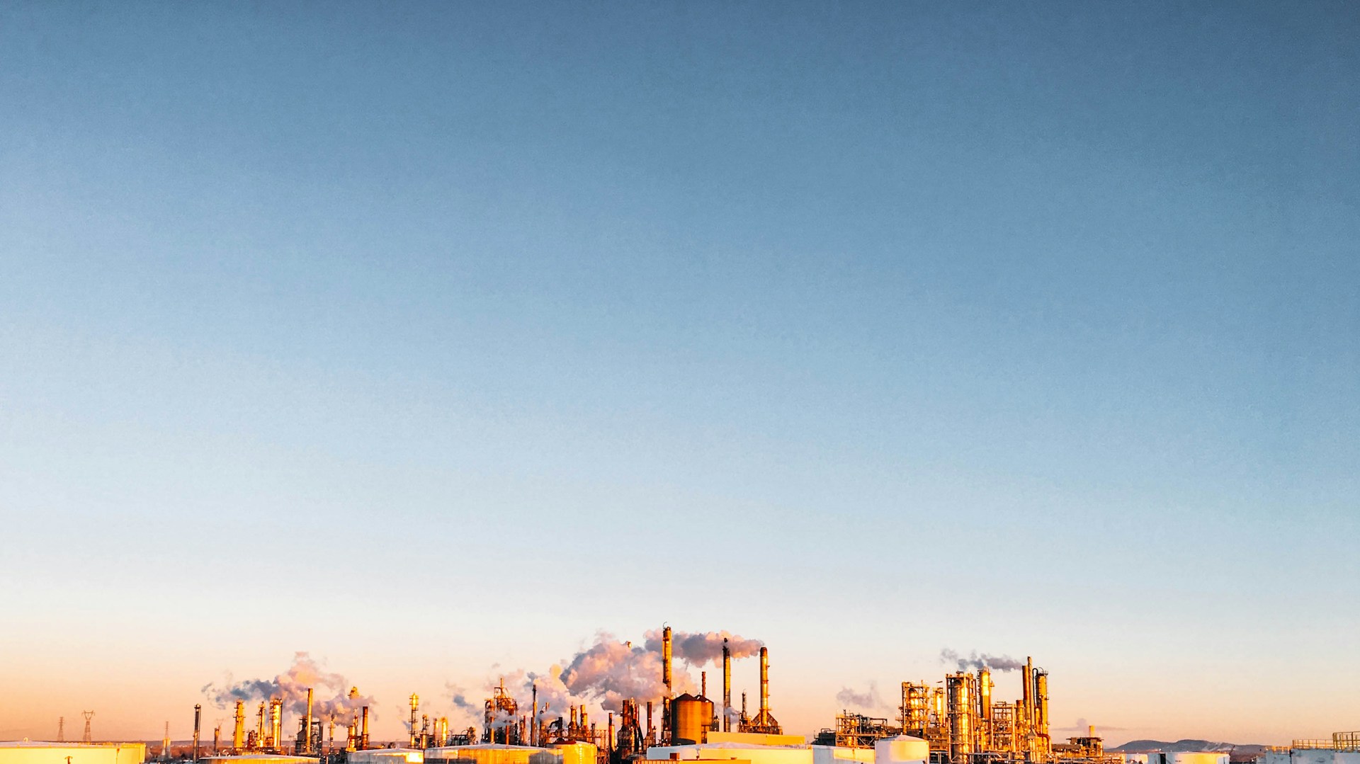 landscape photography of factory at daytime