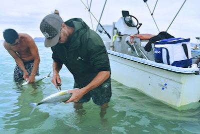 man holding fish