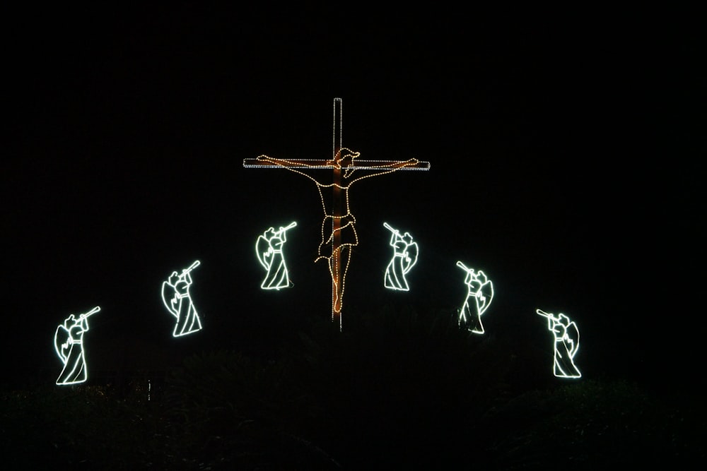 crucifix and angel lights