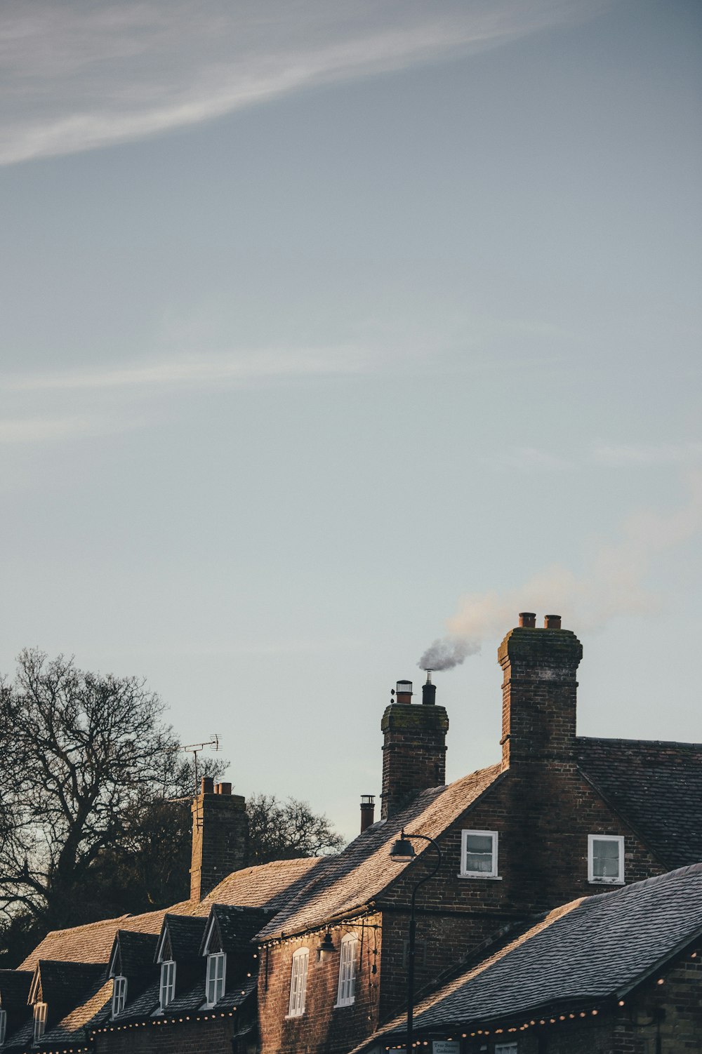 house with chimney smoke