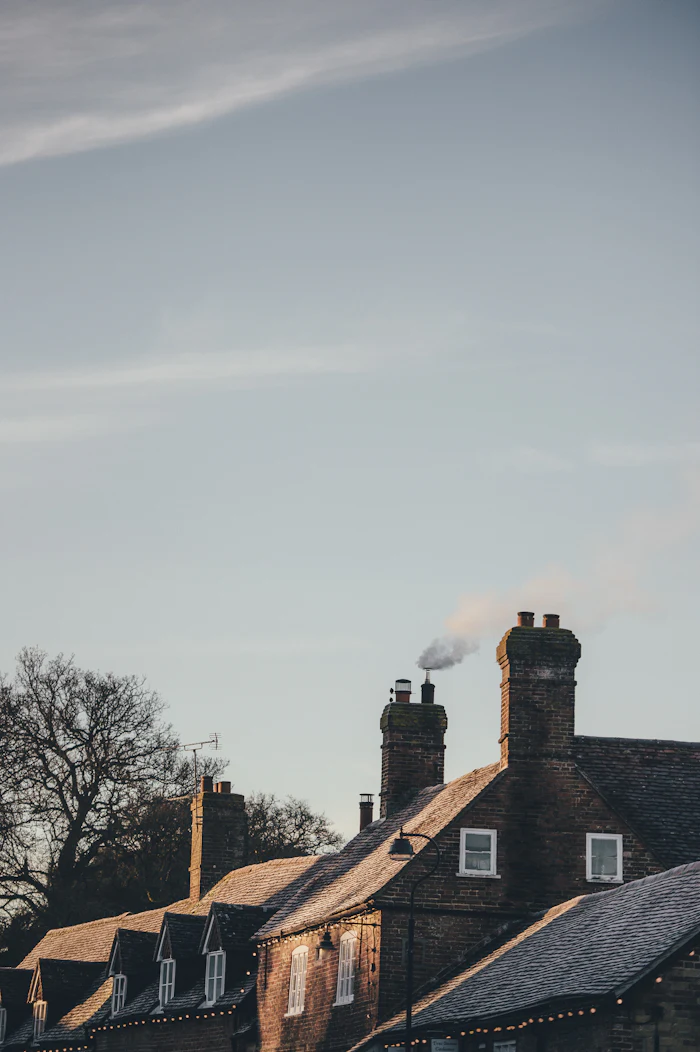 Home with smoke rising from the chimney