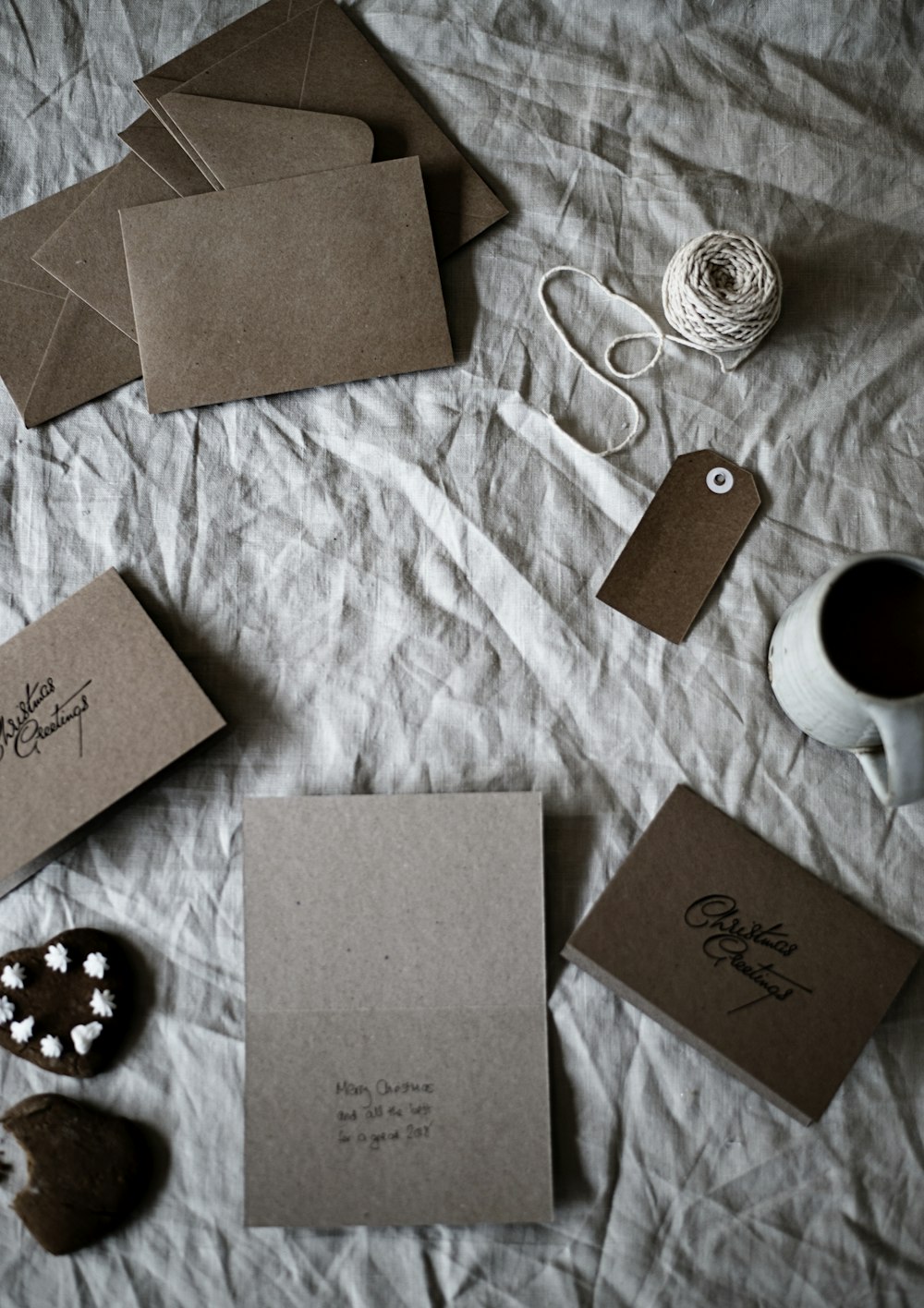 brown envelops on gray textile