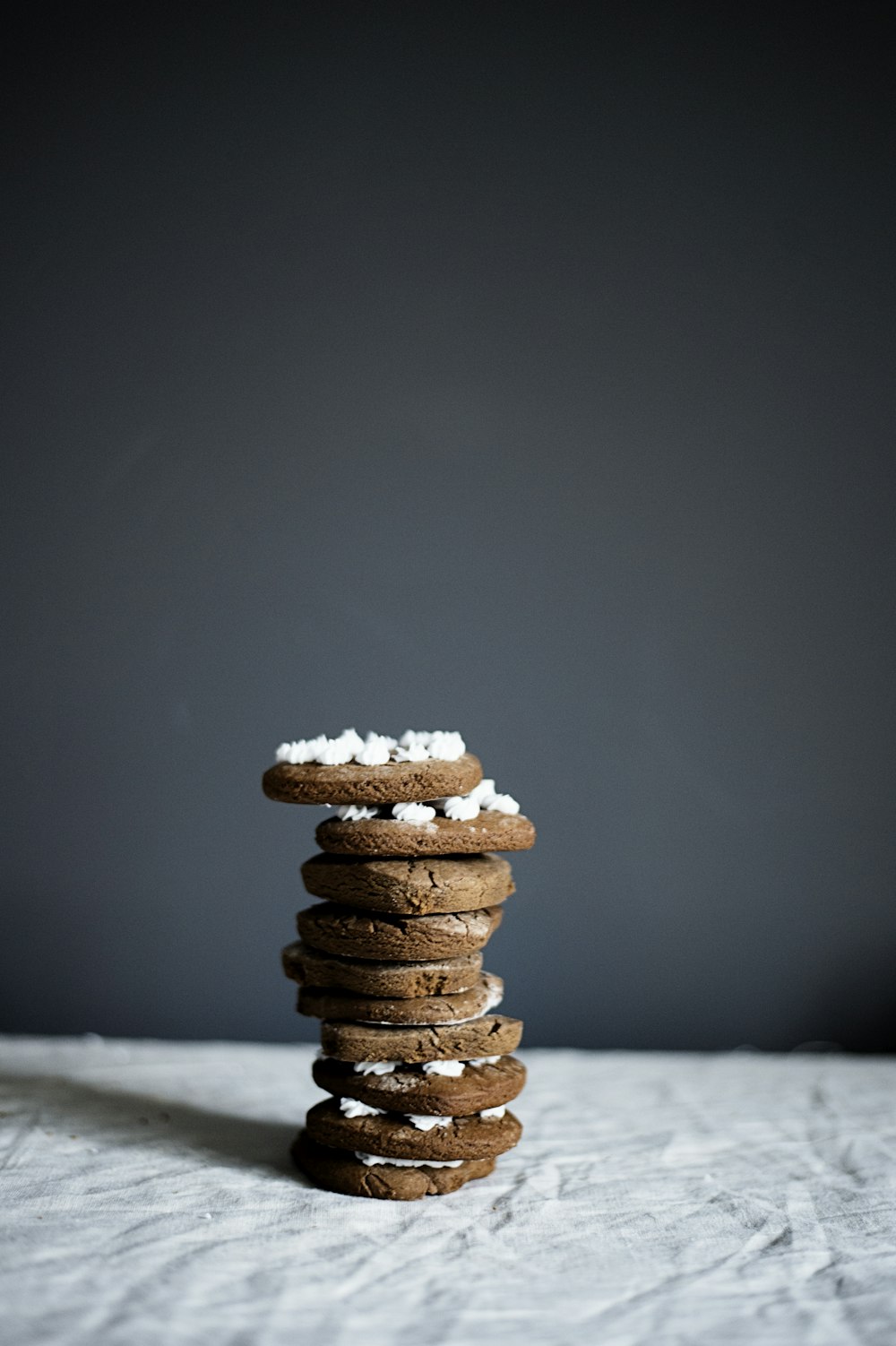 stacked cookies on grey surface