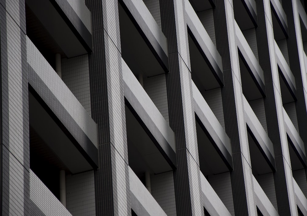 low angle photography of gray multi-story building