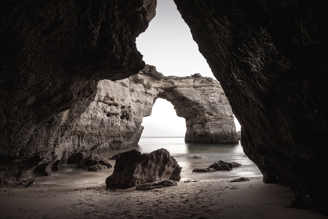 photo of Praia da Marinha Natural arch near Algarve