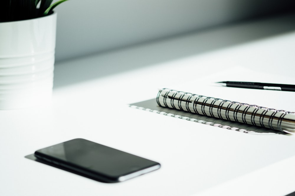 black spiral notebook