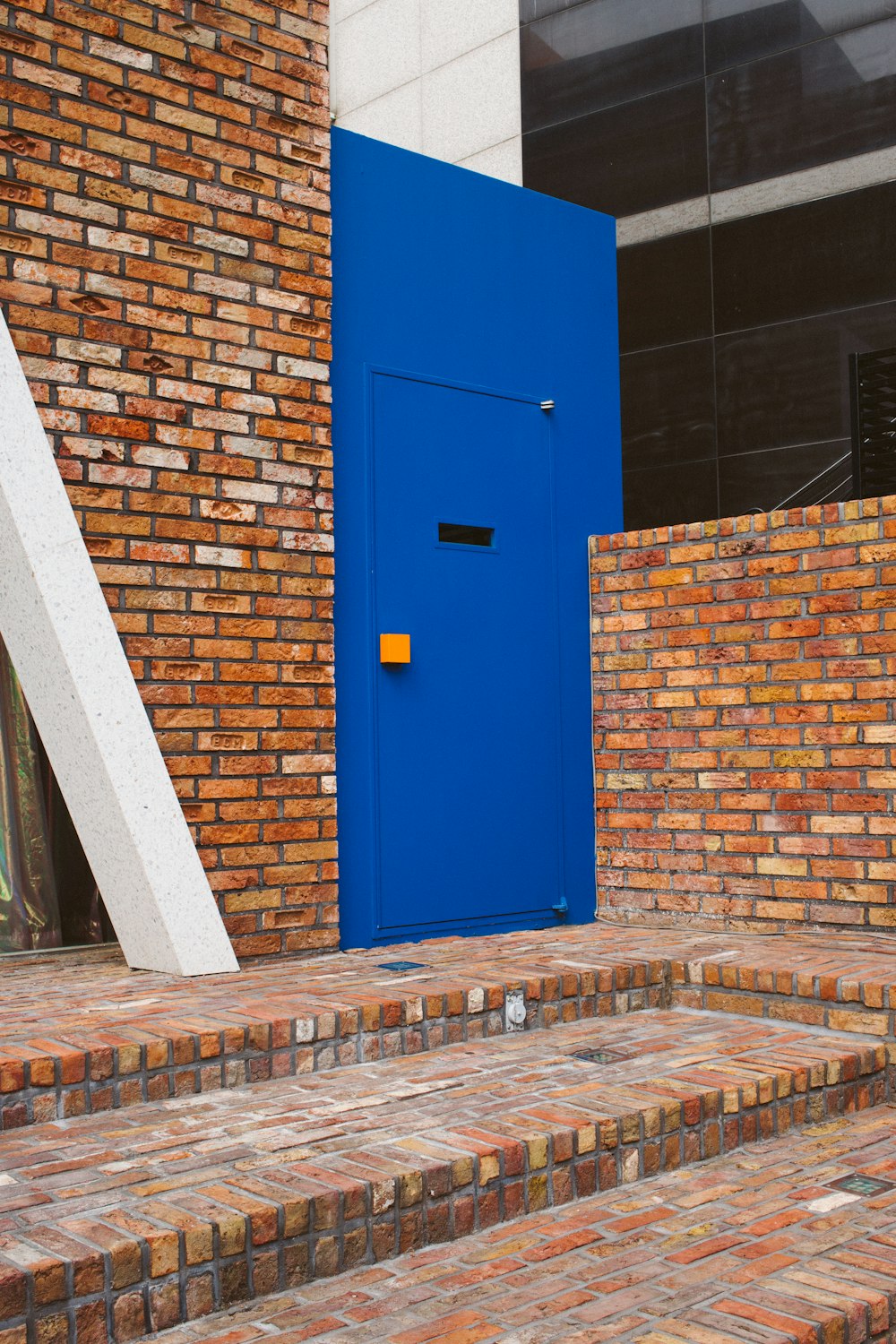 blue metal door closed during daytime