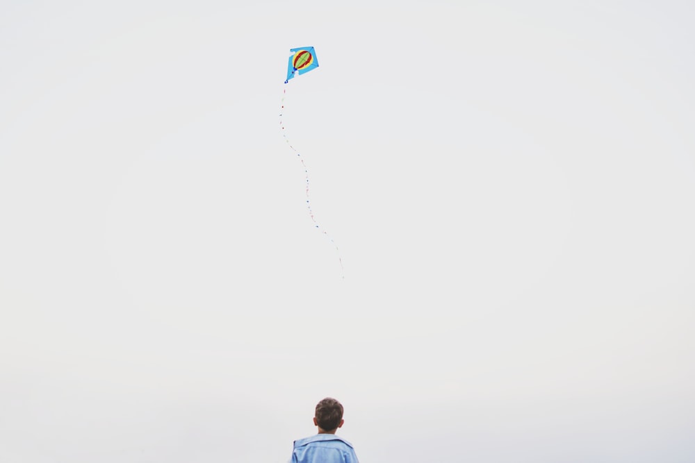 boy playing kite