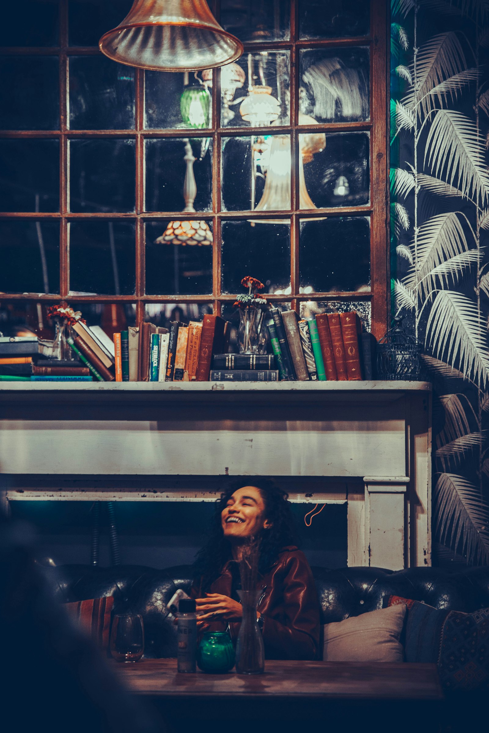 Sony a7 II + Canon EF 24-70mm F2.8L II USM sample photo. Woman smiling while sitting photography