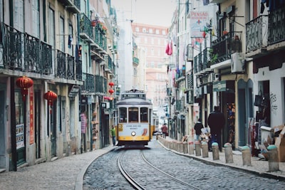 train passing in between buildings portugal google meet background