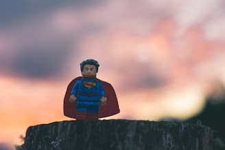 Funko Superman in shallow focus, symbolizing strength and confidence in male sexual health.
