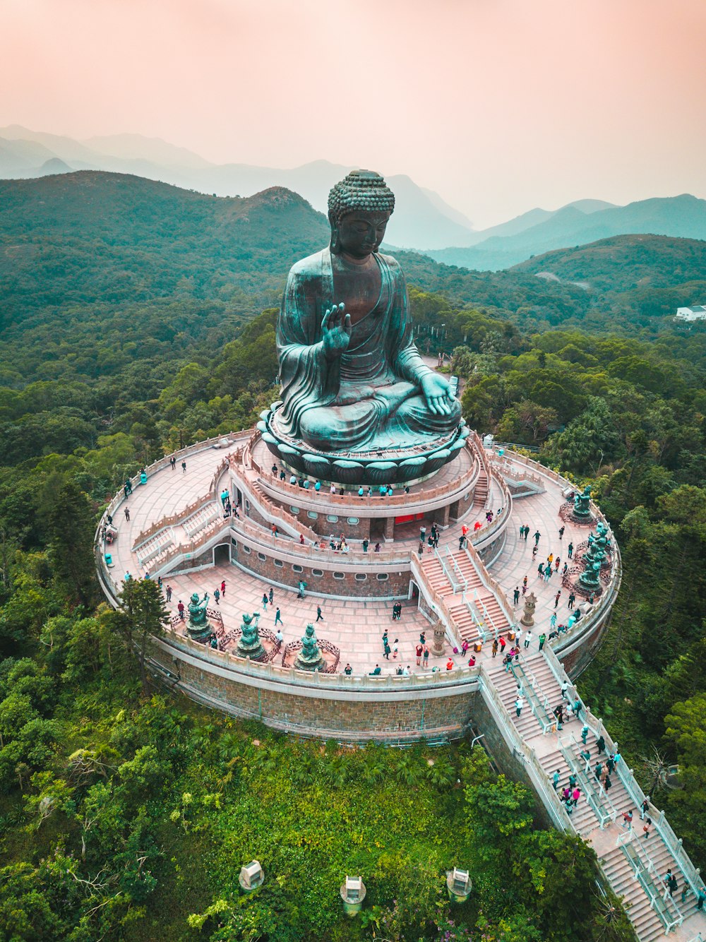 aerial photography of people walking around Bhumishparsha Mudra monument